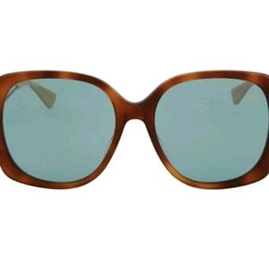 Gucci sunglasses with case, velvet bag